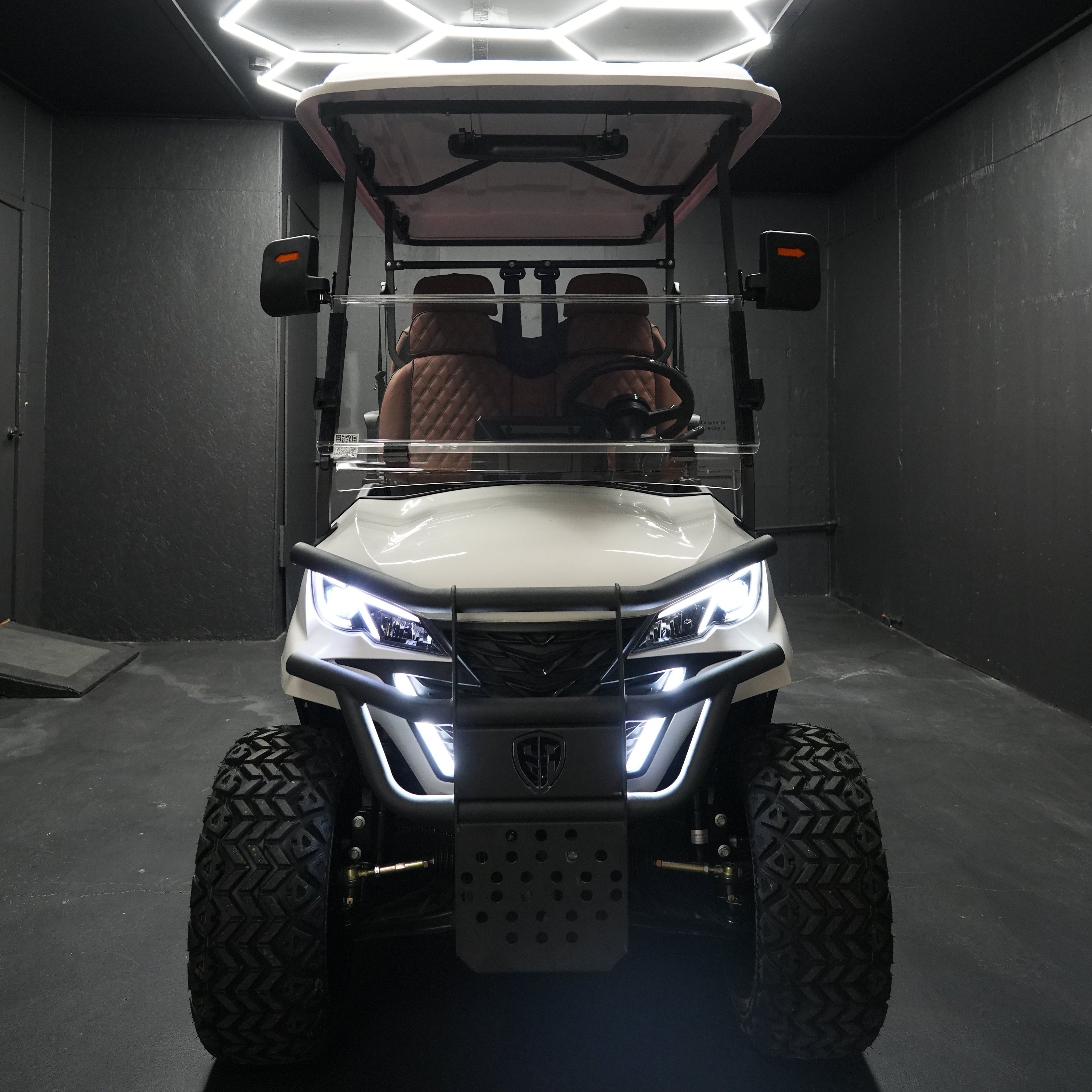 EA4R+ 60V electric golf cart front view with LED headlights and off-road tires